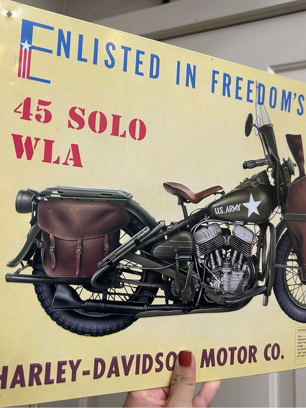 vintage-style metal sign  the classic olive-green World War II Harley-Davidson